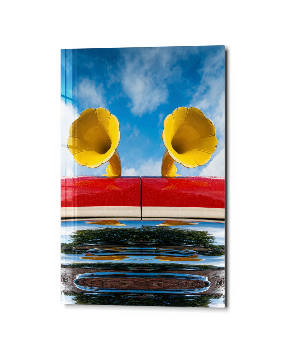 Double Yellow Horns — studio view of glass wall art