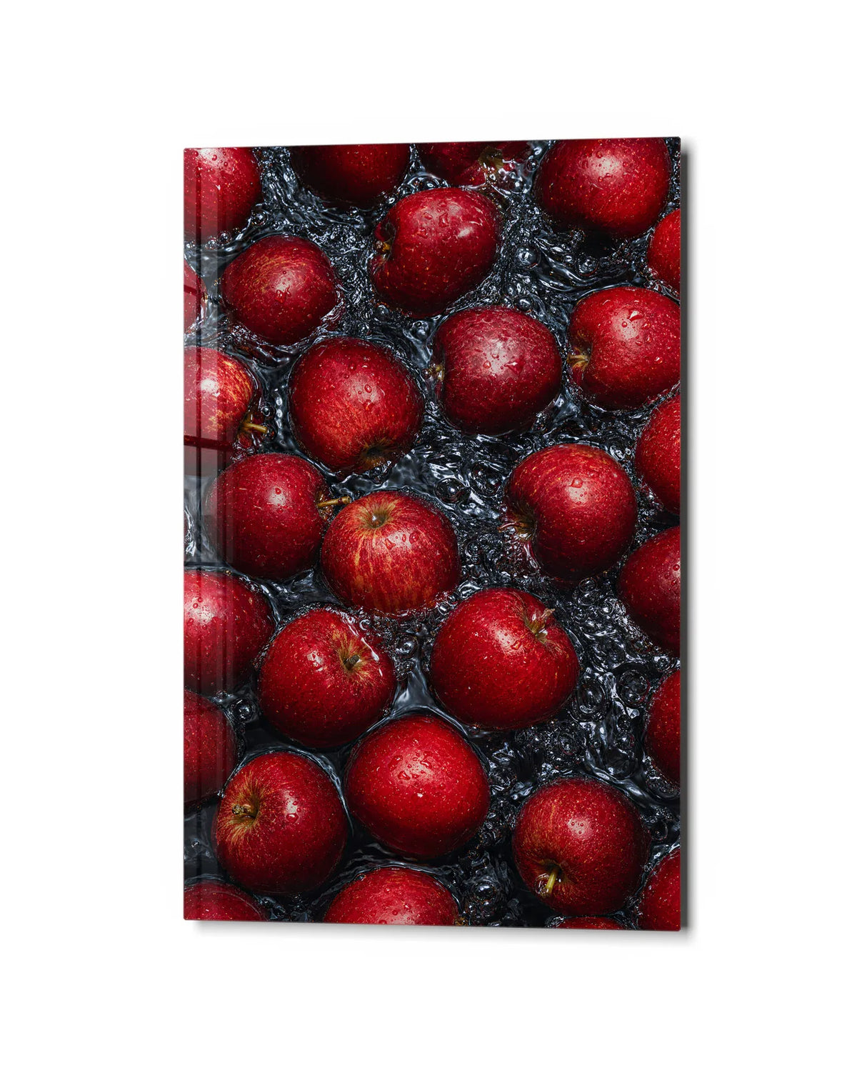 Apples in the Dark — studio view of glass wall art
