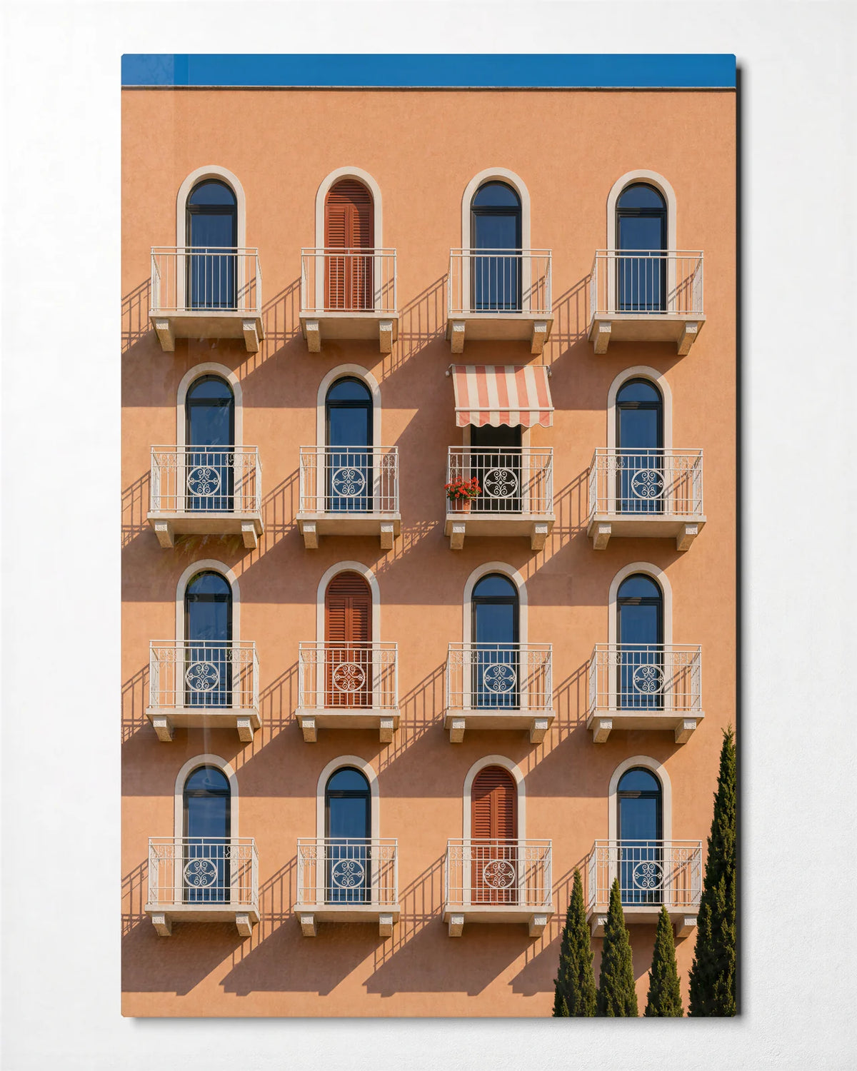 Peach Facade — front view of glass wall art