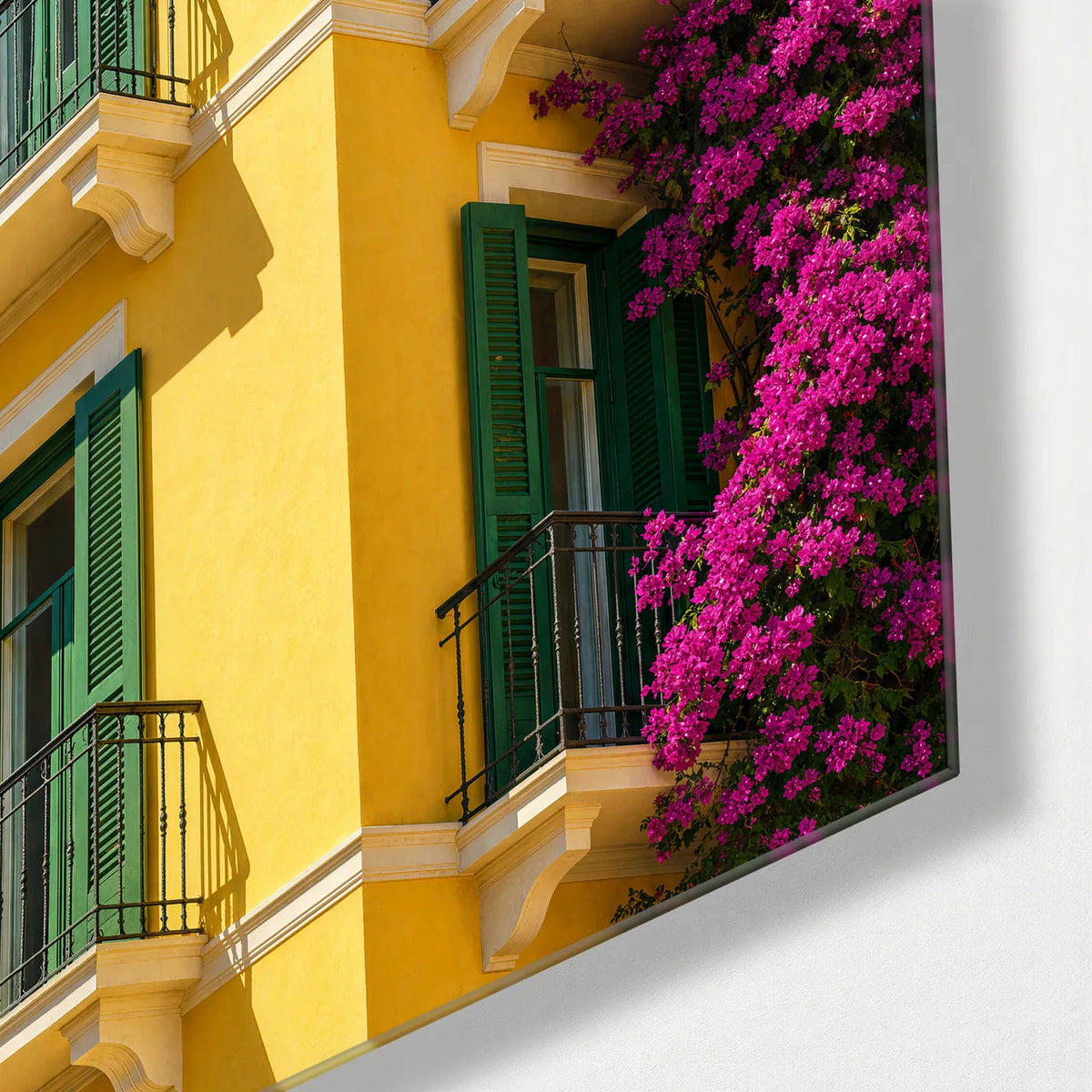 Yellow House Pink Flowers — corner detail of glass wall art