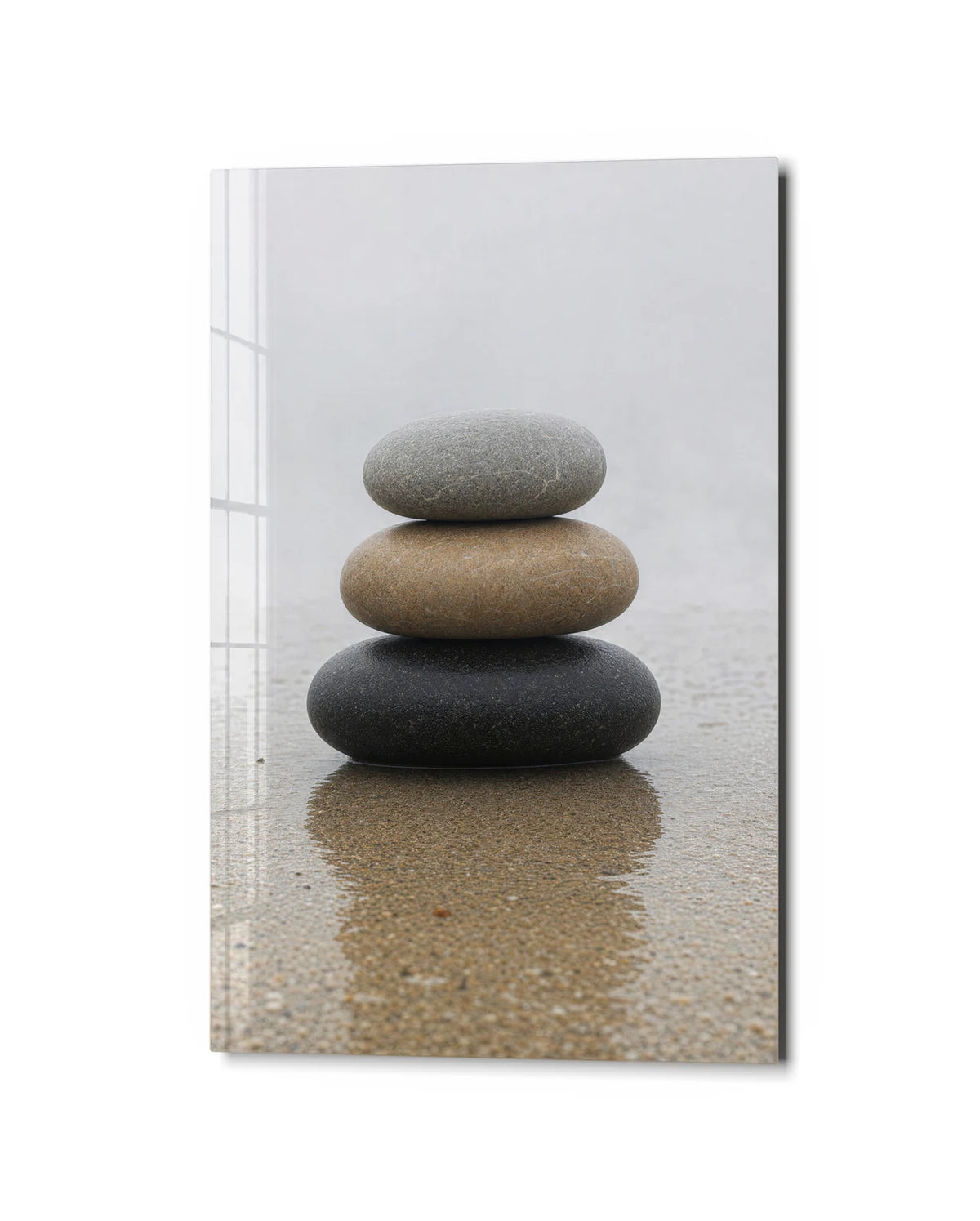 Three Stones Still — studio view of glass wall art