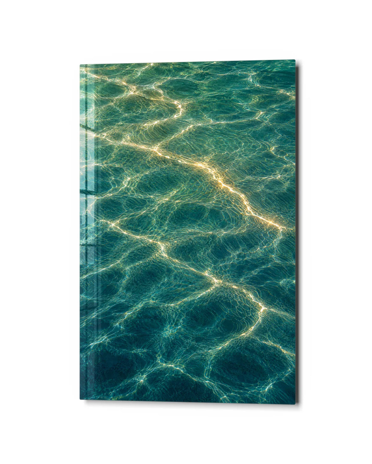 Sun on the Water — studio view of glass wall art