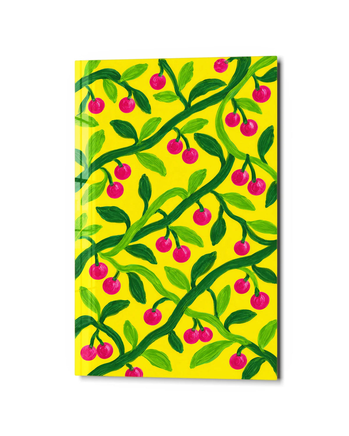 Cherries on Yellow — studio view of glass wall art