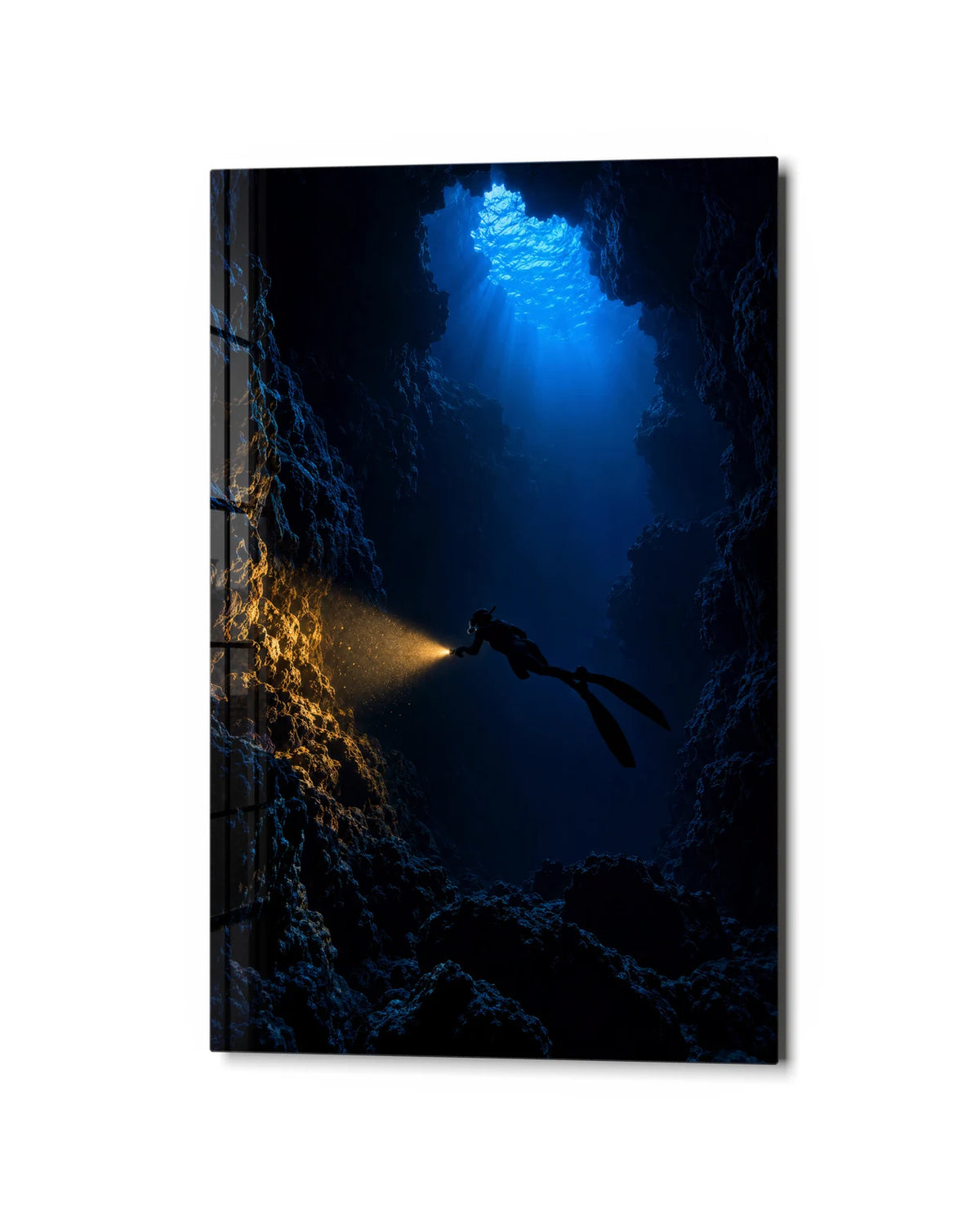 A Light in the Cave — studio view of glass wall art