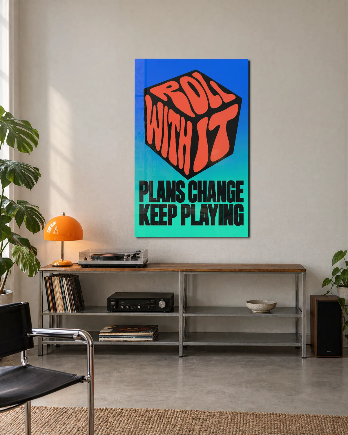 Plans Change Keep Playing — shown in a living space
