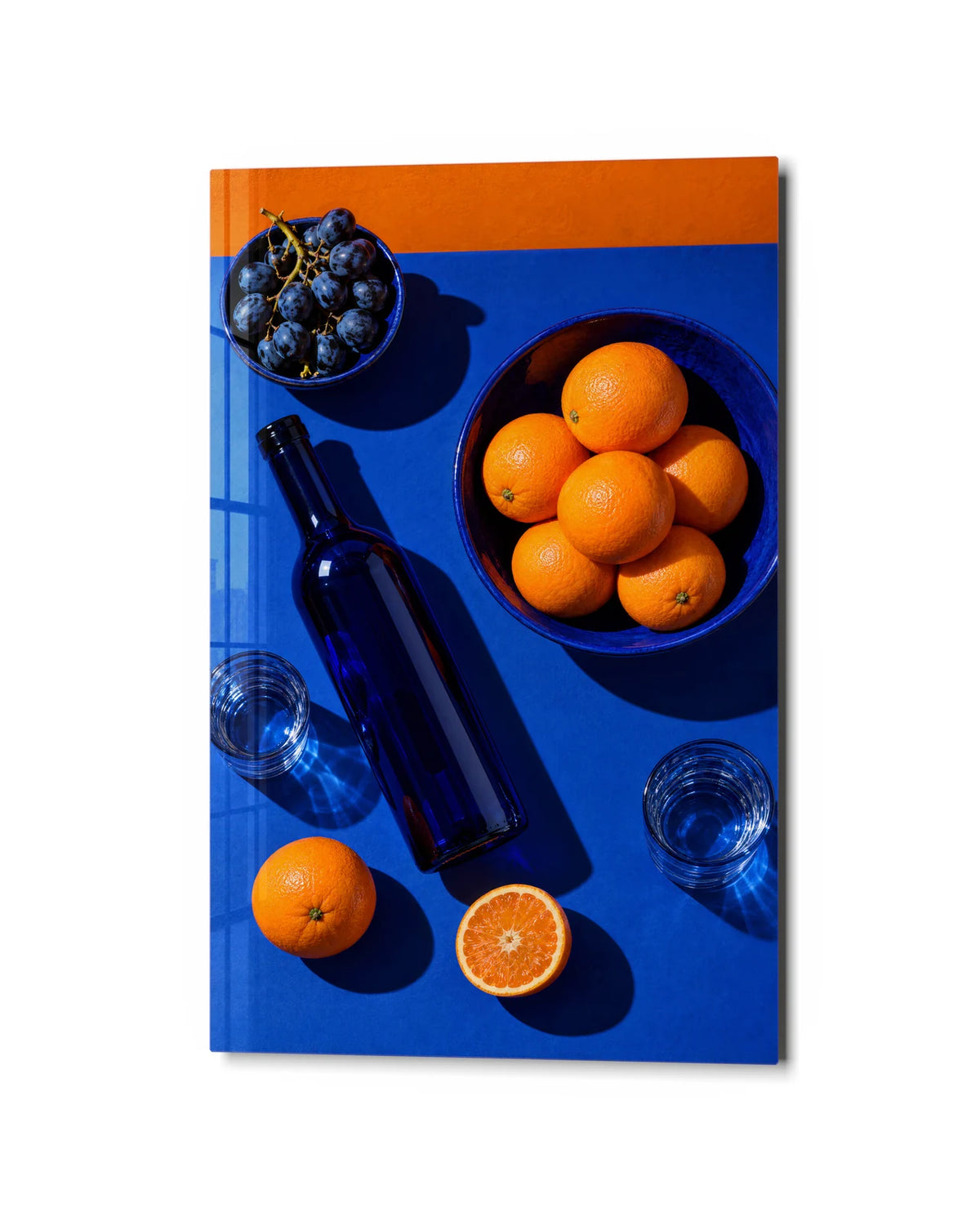 Oranges at the Table — studio view of glass wall art