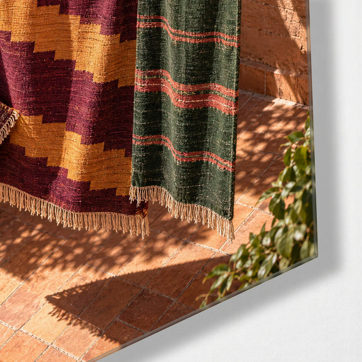 Rugs in the Sun — corner detail of glass wall art
