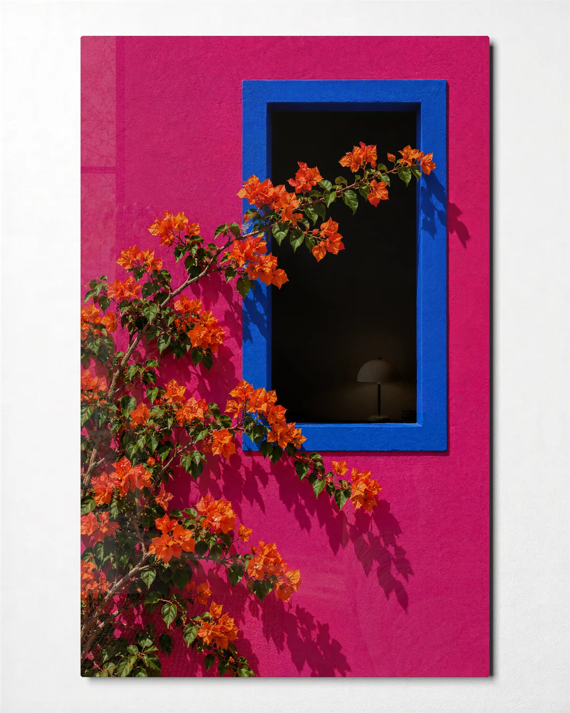 Orange Flowers Blue Frame — front view of glass wall art