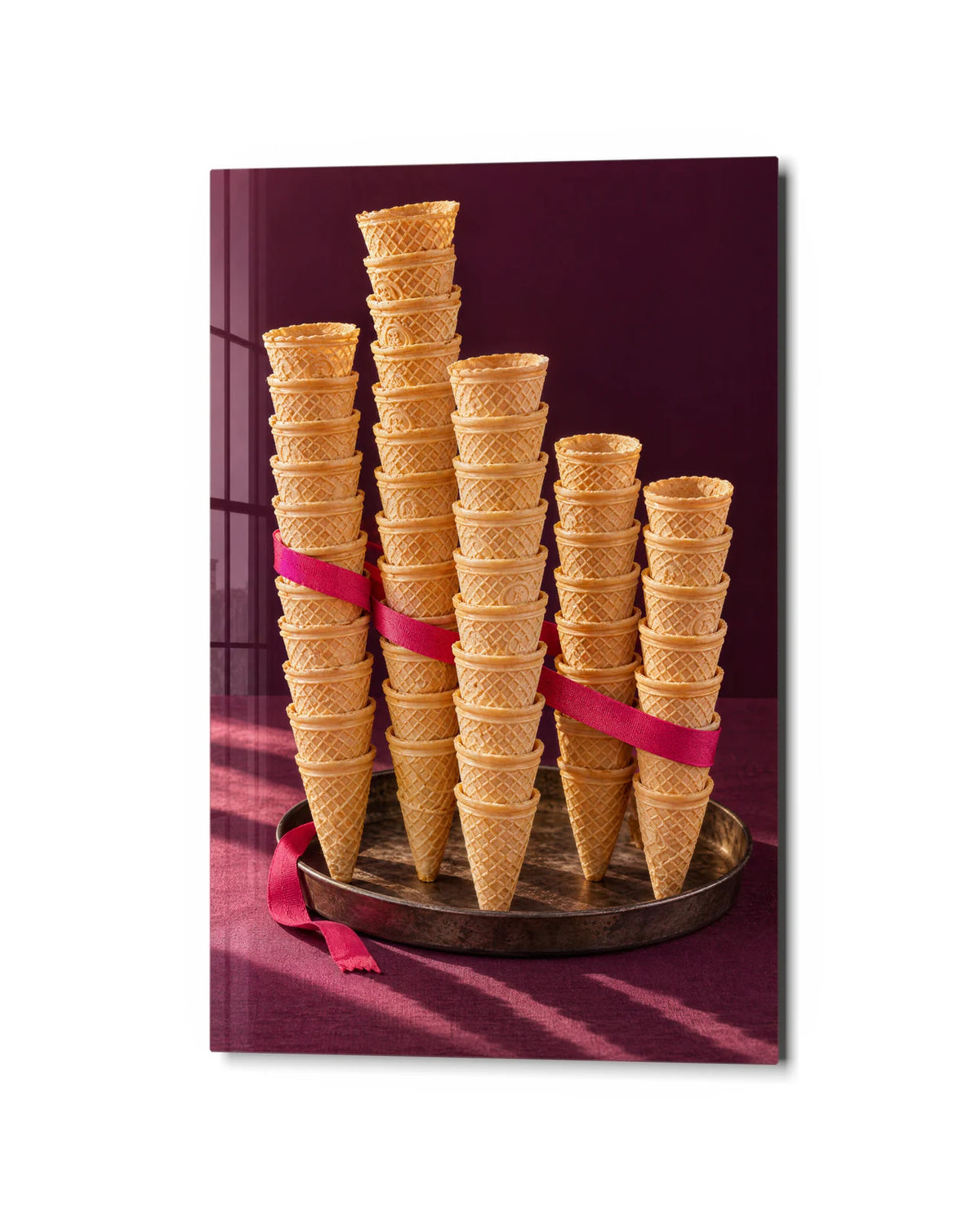A Stack of Cones — studio view of glass wall art