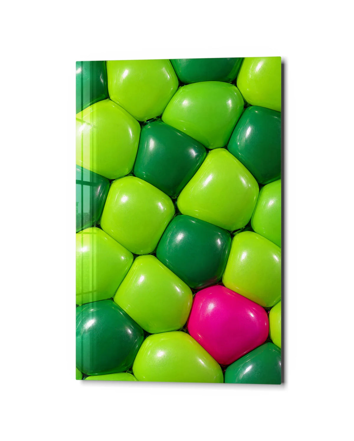 One Pink among Green — studio view of glass wall art
