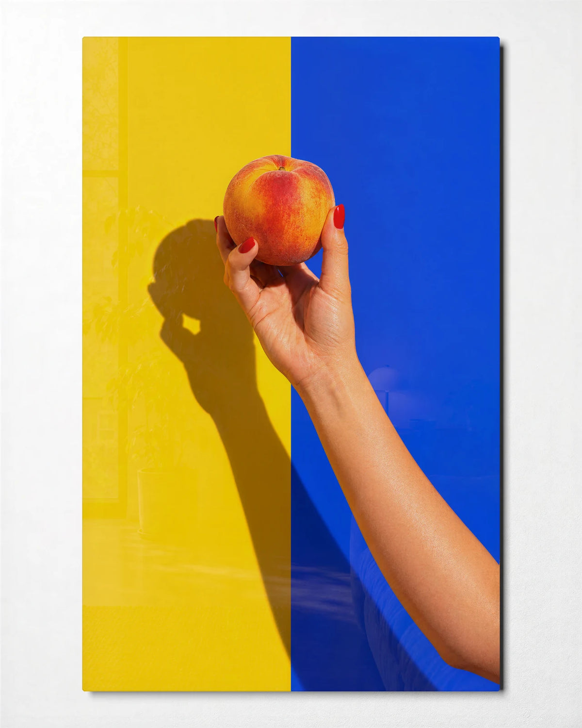 A Peach in Hand — front view of glass wall art