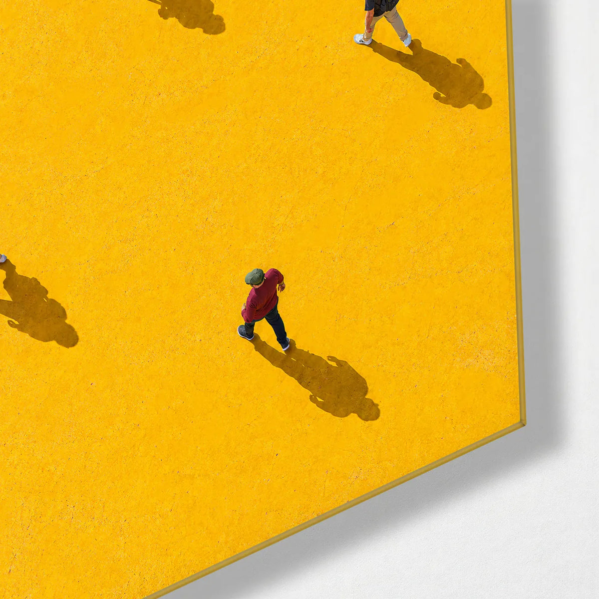 People across Yellow — corner detail of glass wall art
