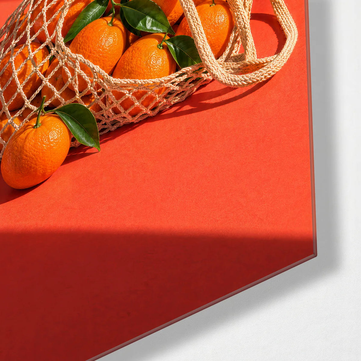 Oranges on the Counter — corner detail of glass wall art
