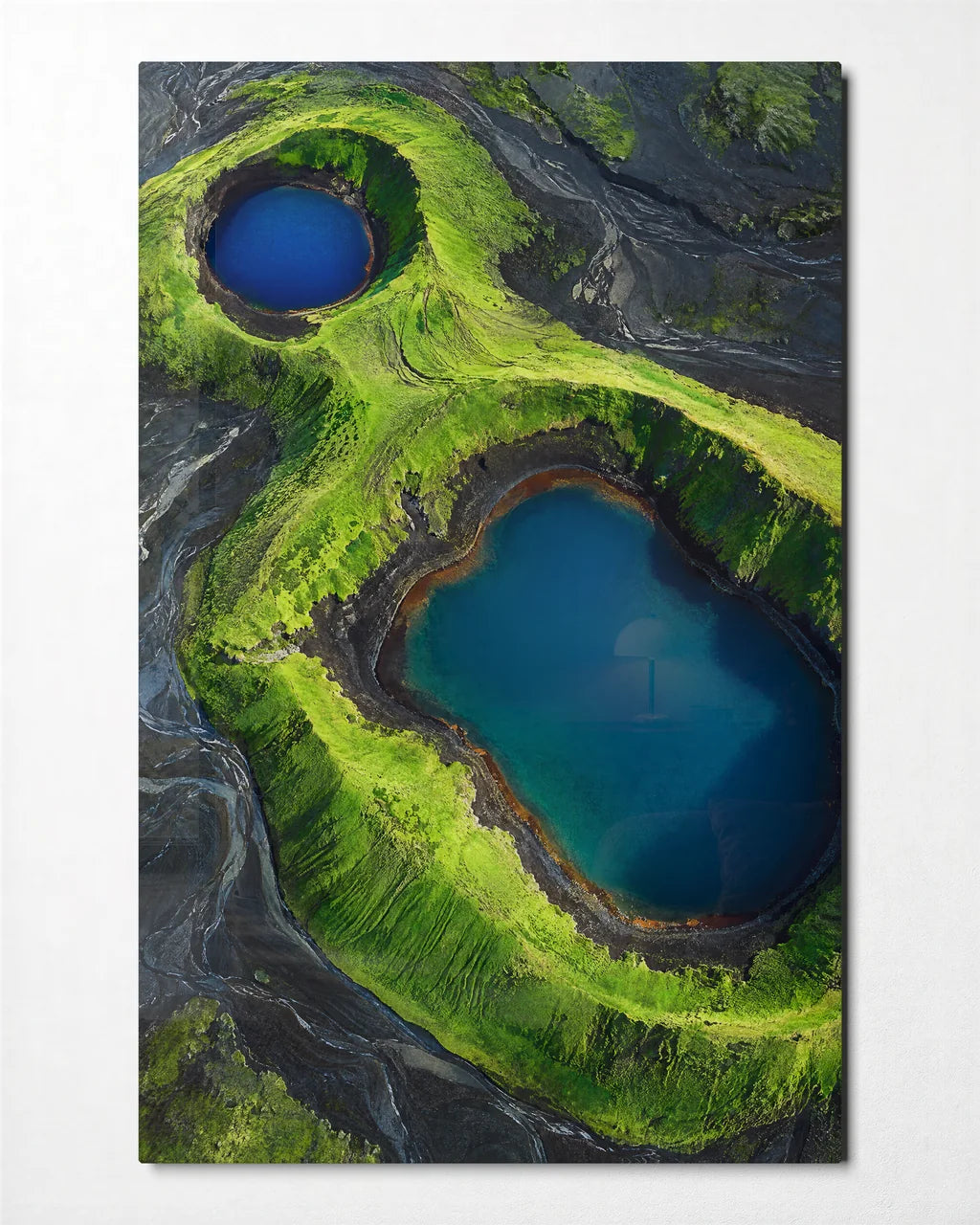 Two Blue Craters — front view of glass wall art