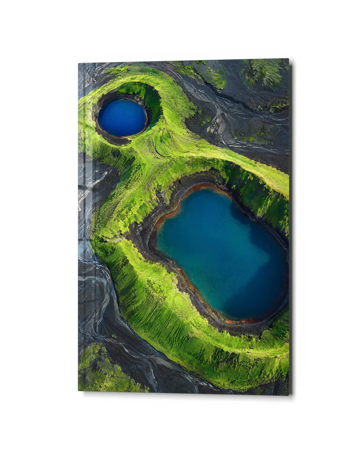 Two Blue Craters — studio view of glass wall art