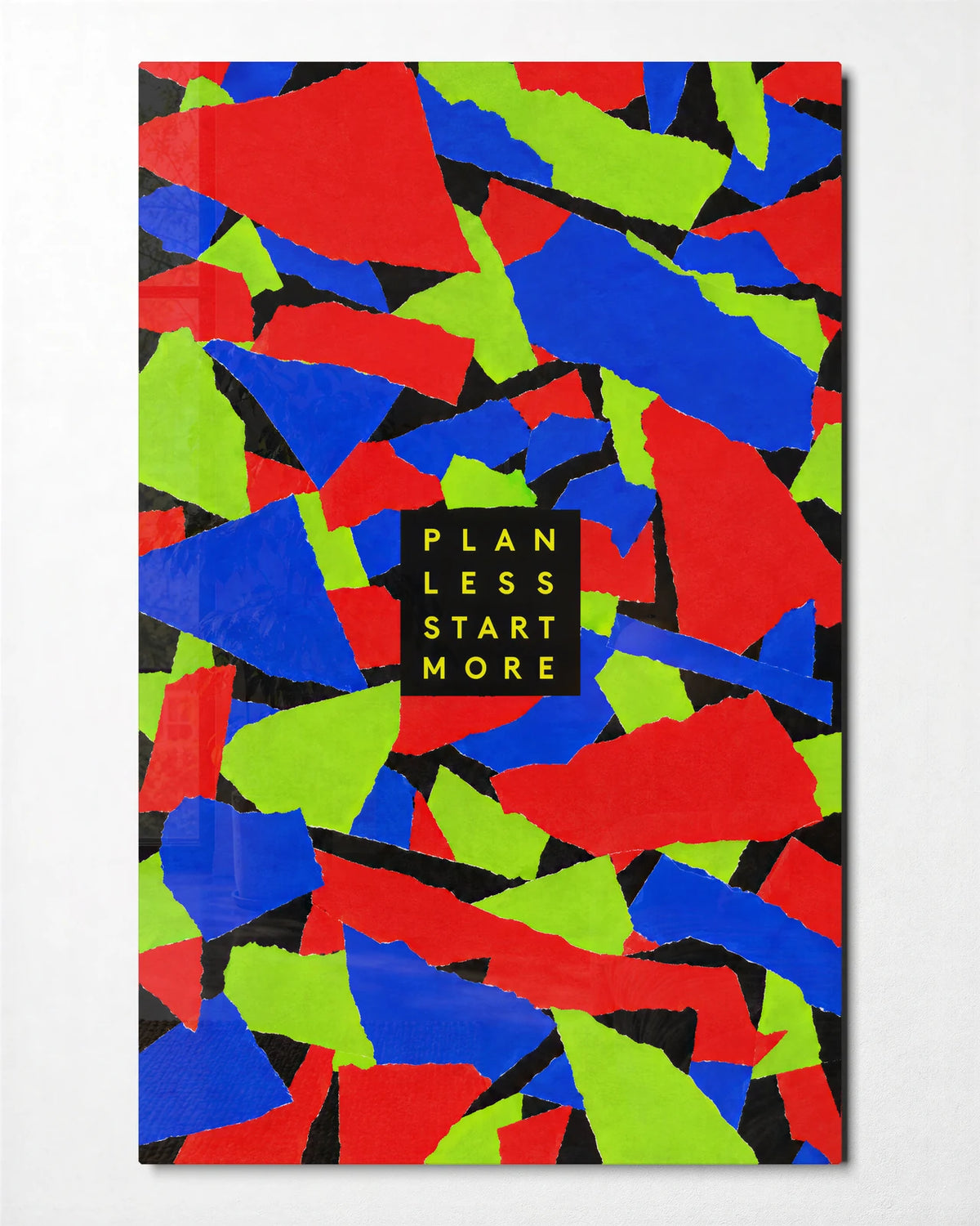 Plan Less Start More — front view of glass wall art