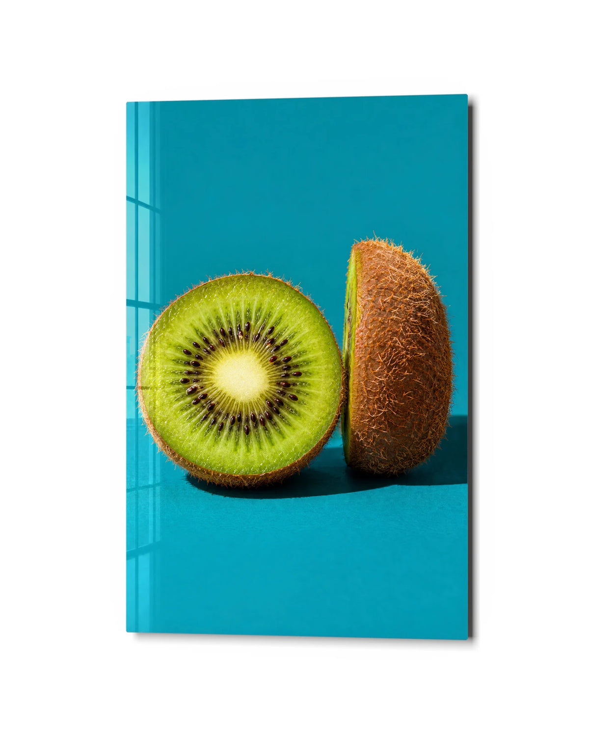Kiwi in Two — studio view of glass wall art
