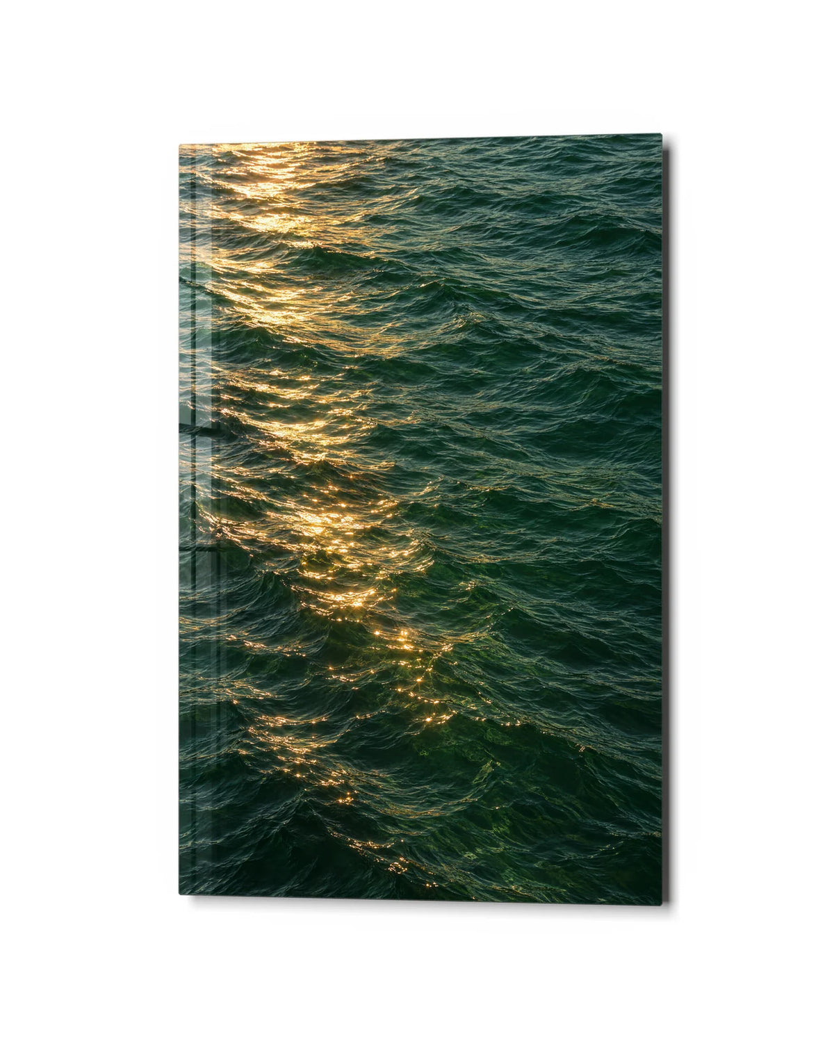 Gold Across Green Water — studio view of glass wall art