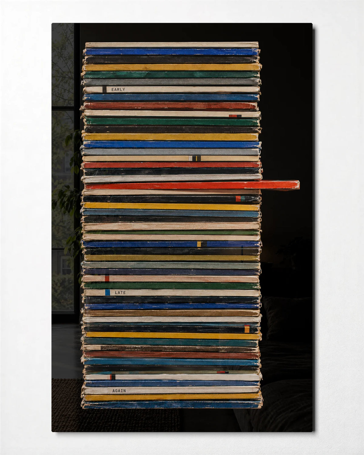 Between the Covers — front view of glass wall art