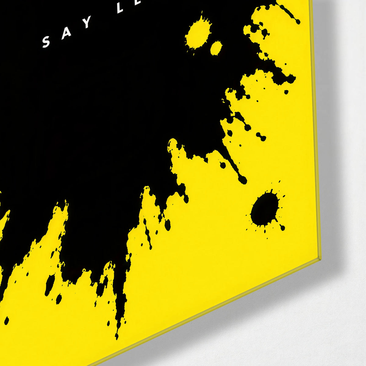 Say Less — corner detail of glass wall art