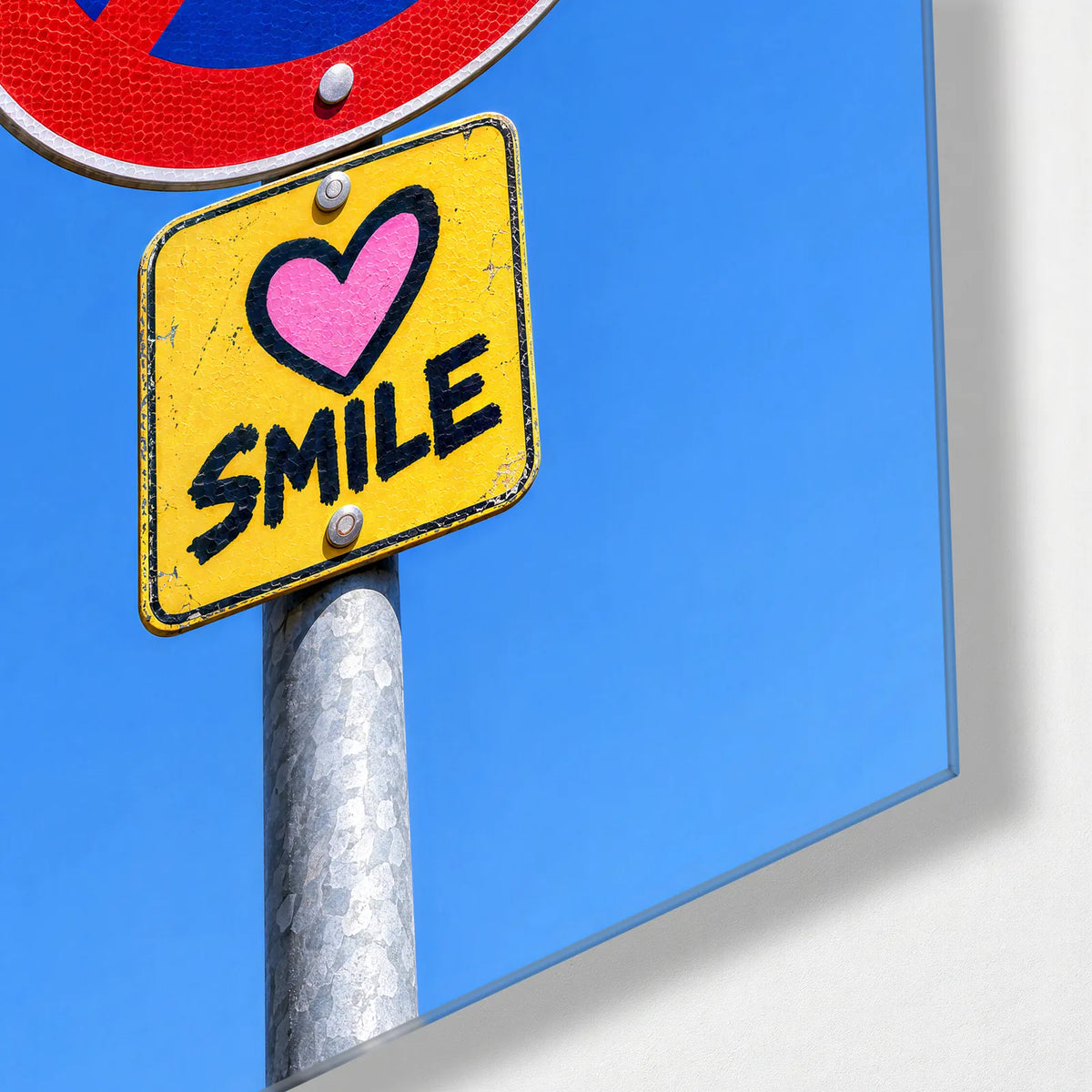 The Sign That Smiles — corner detail of glass wall art