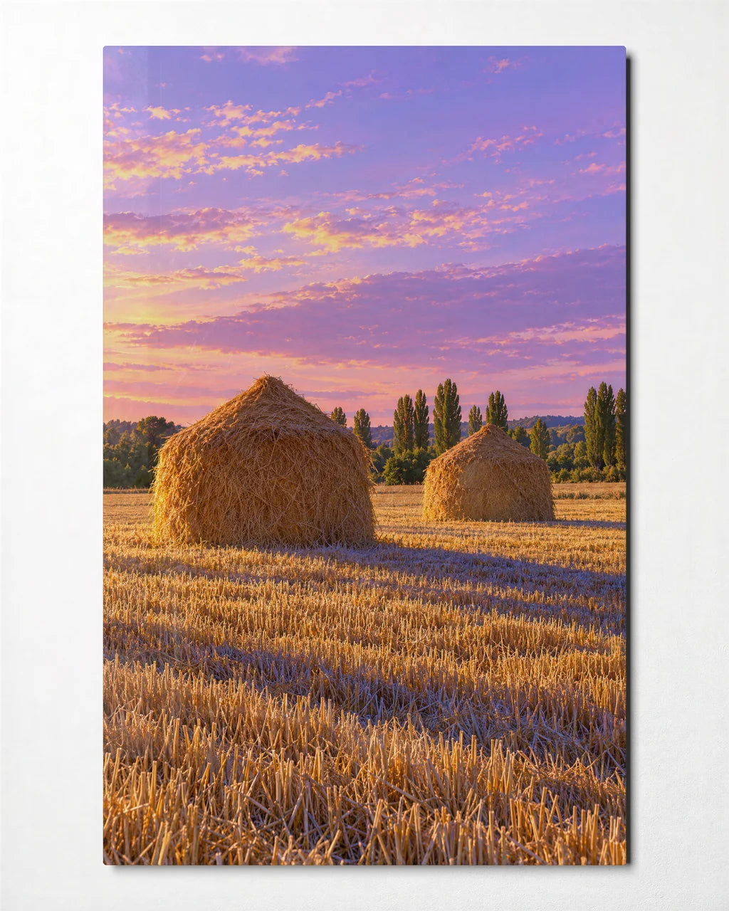 Haystacks at Dusk — front view of glass wall art