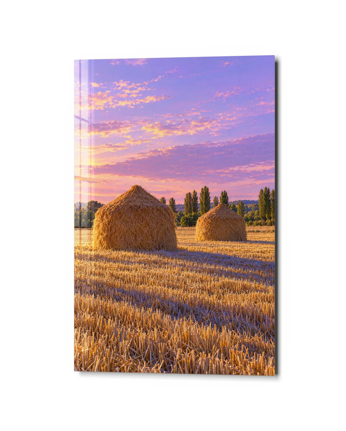 Haystacks at Dusk — studio view of glass wall art