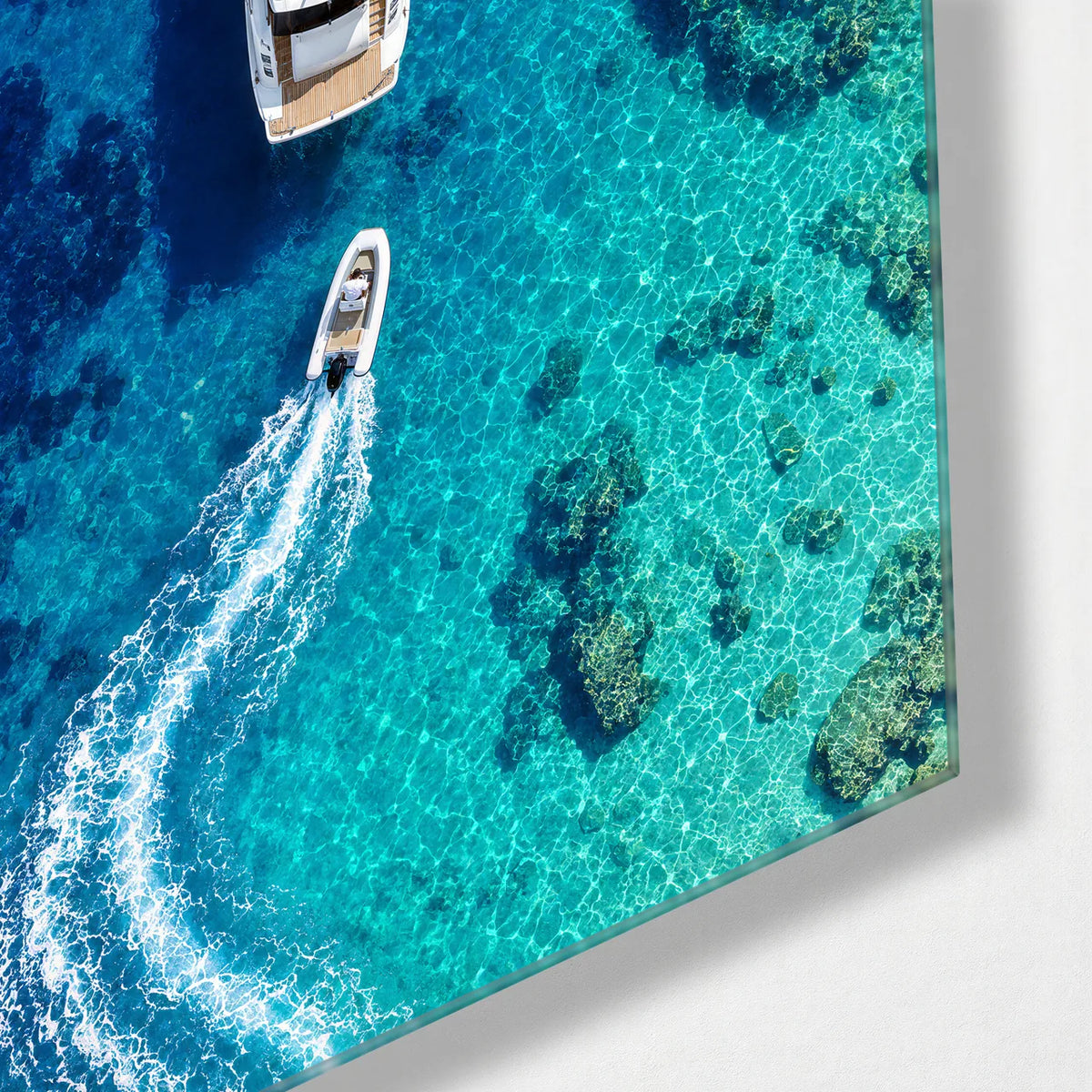 Yacht from Above — corner detail of glass wall art