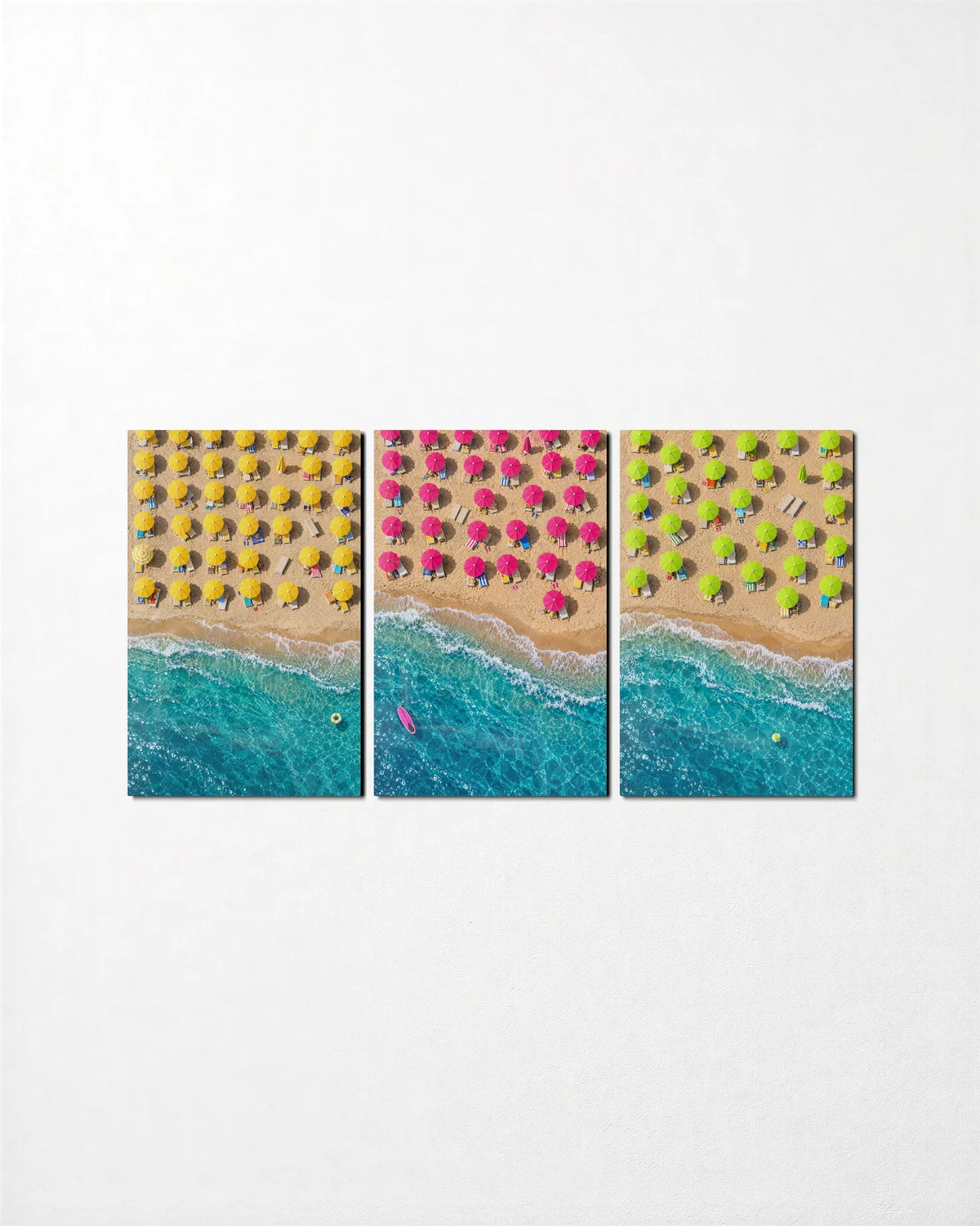 Beach Umbrellas Trio — 3-panel glass wall art set on a wall