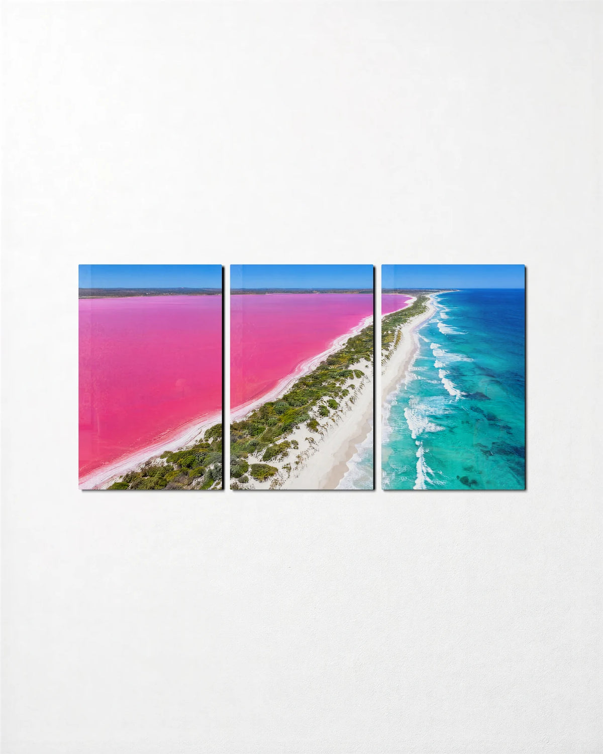 Pink Lake Coast Trio — 3-panel glass wall art set on a wall