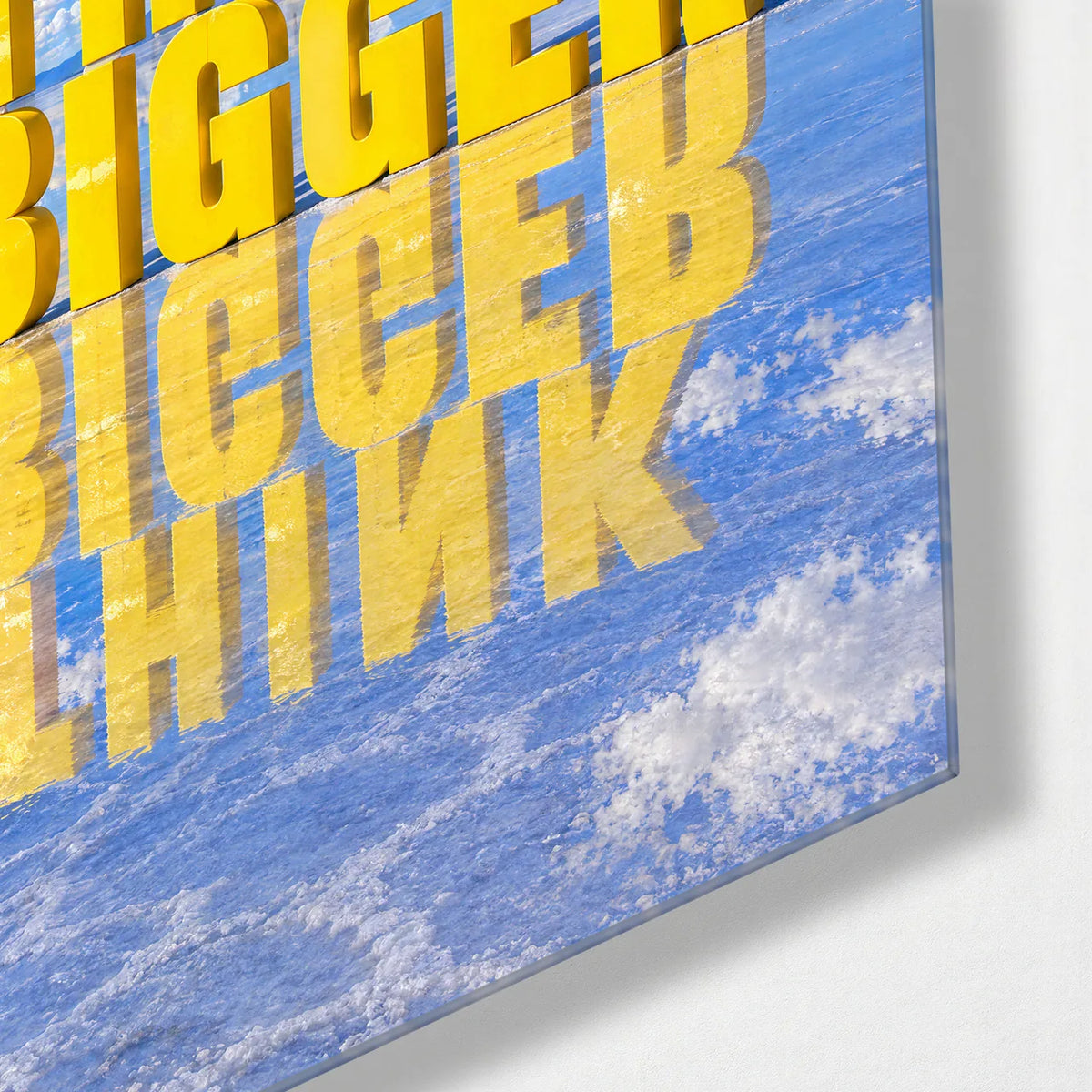 Think Bigger — corner detail of glass wall art
