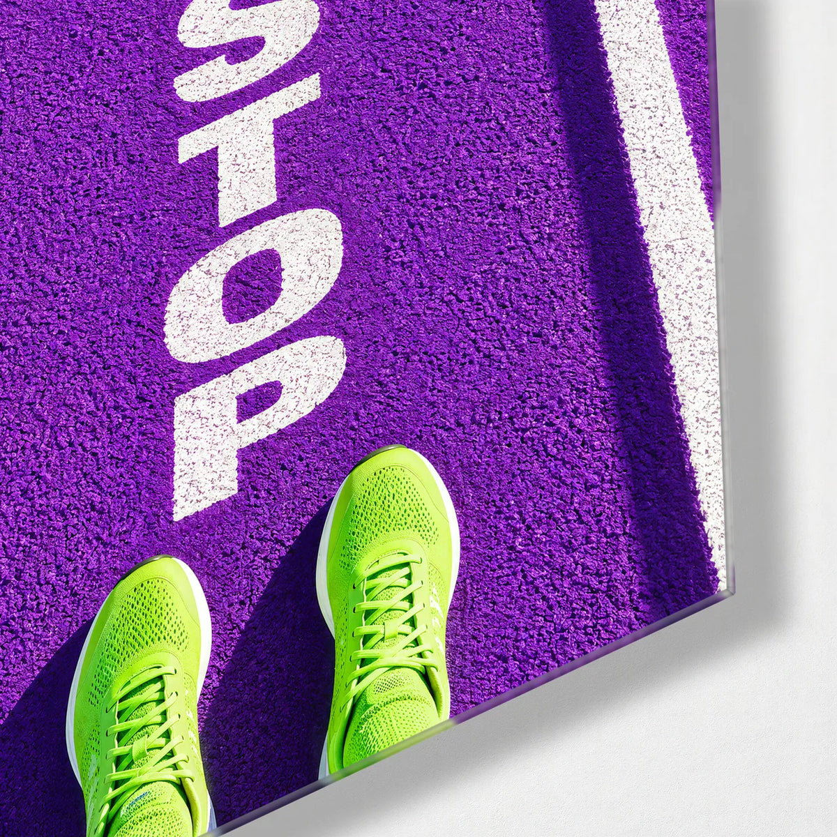 Never Stop — corner detail of glass wall art