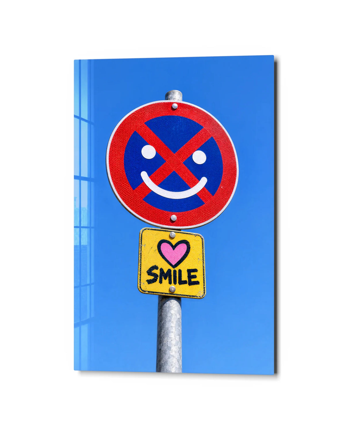 The Sign That Smiles — studio view of glass wall art